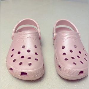 Crocs in pink.  Size women’s 4-5 (XS).  Used in great condition.